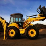 фото Экскаватор-погрузчик New Holland B115B