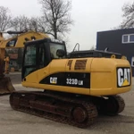 фото Экскаватор CAT 323