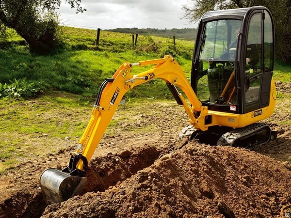 Фото Услуги мини-экскаватора колесного Caterpillar M315D