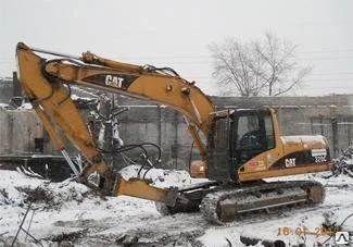 Фото Аренда гидромолота НМ 1270 на базе экскаватора CAT 320