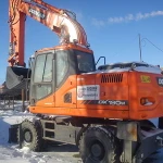 фото Колесный Экскаватор Doosan (Дусан) DX 190 W на пневмоходу объём 1 м3