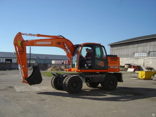 Фото Колесный экскаватор Doosan DX140W