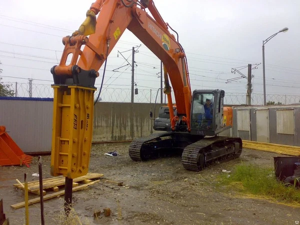 Фото Гидромолот Furukawa F6 на базе NEW HOLLAND B115