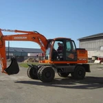 фото Колесный экскаватор Doosan DX140W