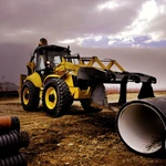 фото Экскаватор-погрузчик New Holland B115B