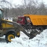 фото Вывоз снега спецтехникой