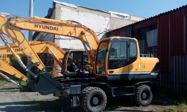 Фото Колесный экскаватор HYUNDAI R140W-9S.