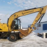 фото Аренда колесного экскаватора Caterpillar M315D, Салехард