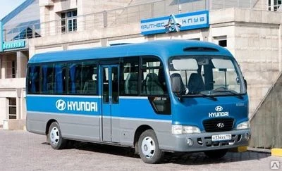 Фото Аренда микроавтобуса Hyundai County (21+6 мест) по городу в будни