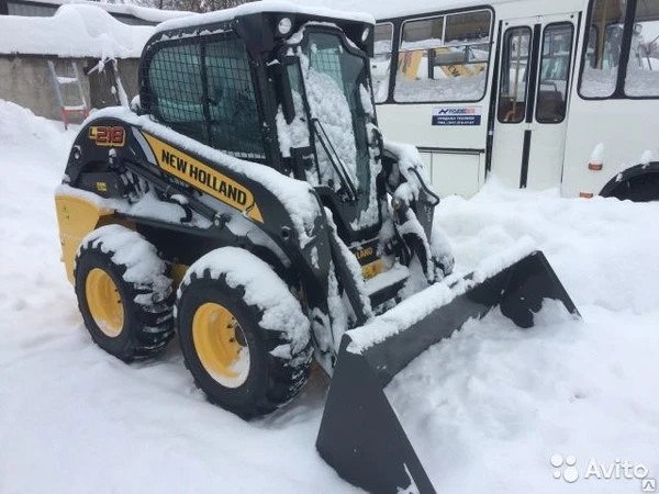 Фото Мини-погрузчик колесный New Holland L218