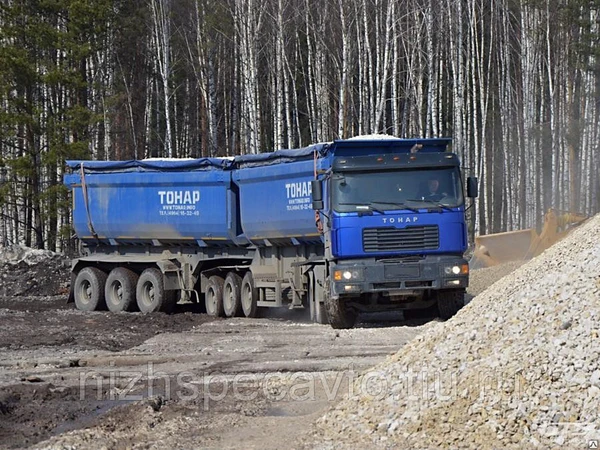 Фото Сочлененный самосвальный автопоезд с боковой разгрузкой на правую сторону