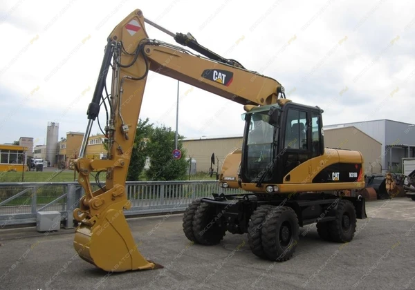 Фото Аренда колесного экскаватора Caterpillar M316D, Химки