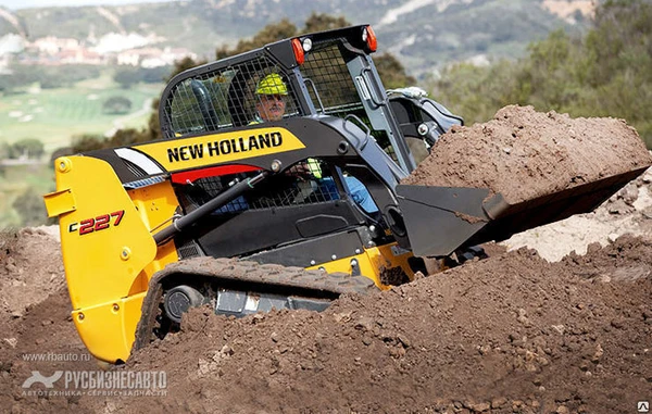 Фото Мини-погрузчик гусеничный New Holland С227