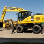 фото Услуги экскаватора погрузчика Komatsu