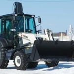 фото Экскаватор погрузчик TEREX 825 Экскаватор-погрузчик