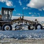 фото Услуги по уборке снега грейдером