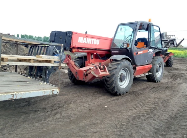 Фото Телескопический погрузчик Manitou 1840