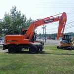 фото Аренда колёсного экскаватора Doosan DX190W