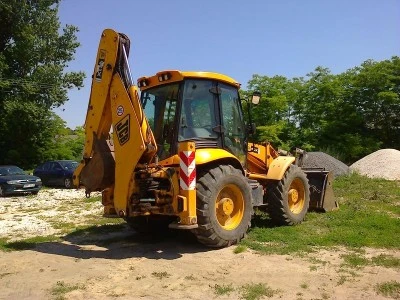 Фото Недорогой экскаватор-погрузчик FIAT KOBELCO FB 100.2