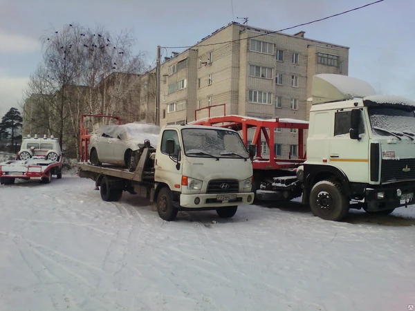 Фото Эвакуатор. Перевозка легковых автомобилей и коммерческого транспорта.