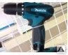 фото Аккумуляторная дрель MAKITA DF330DWLE 10.8В 2x1.3Ач LiION 10мм