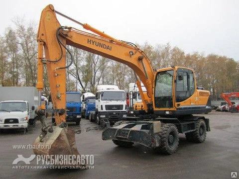 Фото Экскаватор колесный HYUNDAI R180W-9S (2013г.)