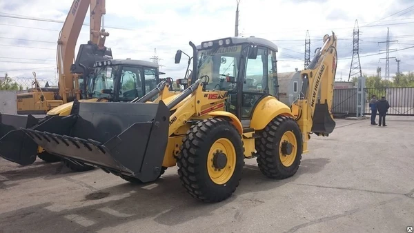 Фото Экскаватор-погрузчик New Holland B115B (Нью Холланд))