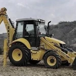 фото Экскаватор-погрузчик New Holland b115