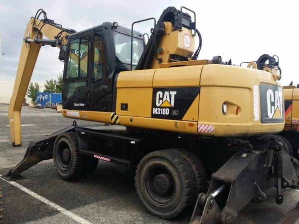 Фото Аренда колёсного экскаватора Caterpillar M318D