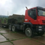 фото Услуги полноприводного тягача Iveco AMT633910 (трал 60 т) в габарите