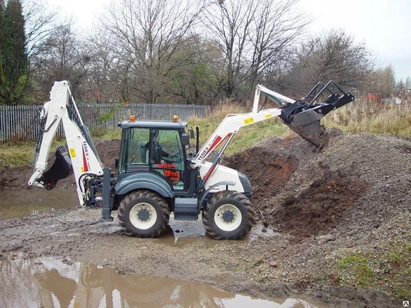 Фото Экскаватор-погрузчик TEREX 970 Экскаватор погрузчик новый в наличии