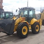 фото Экскаватор-погрузчик New Holland B115B (Нью Холланд))