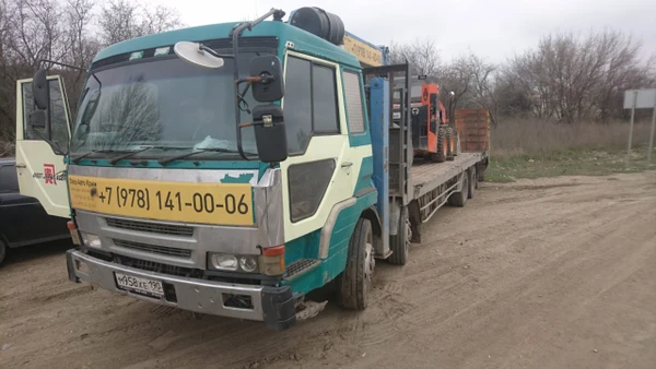 Фото Манипулятор-эвакуатор грузовой Mitsubishi Fuso (гр/п до 20 т, стрела 4 т, вылет 16 м по вертикали)