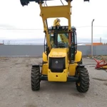 фото Экскаватор-погрузчик New Holland B90B