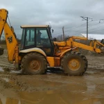 фото Копание траншей под воду JCB 4CX