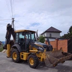 фото Аренда экскаватора-погрузчика John Deere 325J, Воронеж