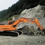 фото Габаритный Гусеничный Экскаватор Doosan DX 225NLC