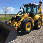 фото Однозубый рыхлитель на базе NEW HOLLAND B115