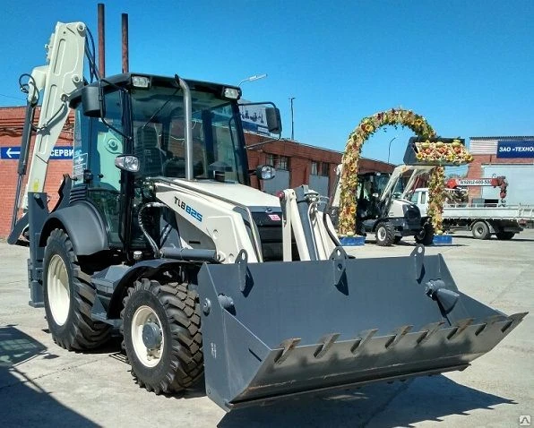 Фото Экскаватор-погрузчик Terex TLB 825-RM (Комплектация с телескопом)