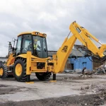 фото Аренда ямобура на базе экскаватора погрузчика jcb.