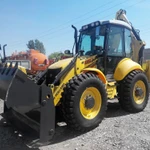 фото Экскаватор-погрузчик New Holland B115