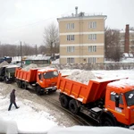 фото Вывоз снега самосвалами