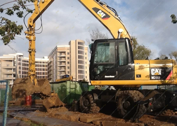 Фото Аренда колесного экскаватора Caterpillar M315D, Москва