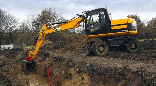 Фото Аренда колесного экскаватора Caterpillar M313D, Домодедово