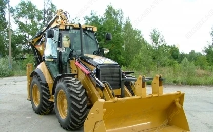 Фото Аренда экскаватора-погрузчика Caterpillar 444E, Москва