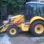 фото Экскаватор-погрузчик New Holland B90