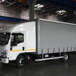 фото ISUZU ELF 9,5 4х2 Шторный фургон Евро-5