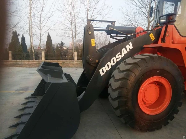 Фото Фронтальные погрузчики Doosan DL507-9c ковш 4 куб.м. новый