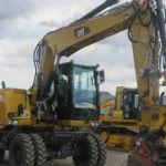 фото Аренда колесного экскаватора Caterpillar M313D, Москва