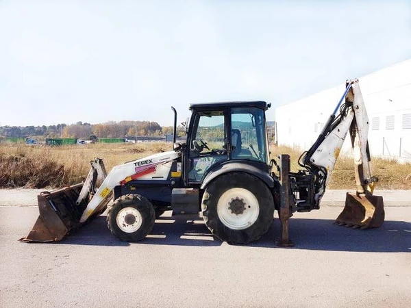 Фото Экскаватор-погрузчика Terex 815